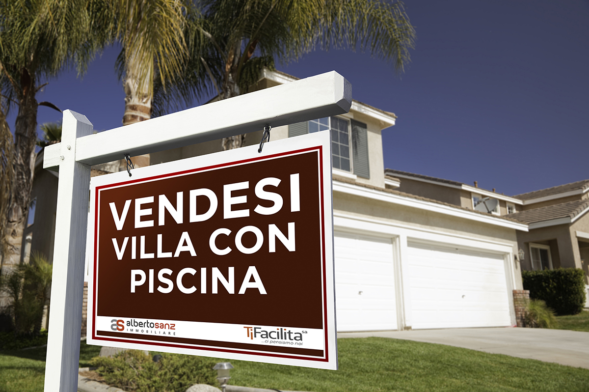 For Sale Real Estate Sign in Front of House.